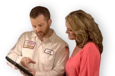 Tech talking to customer about maintenance agreements